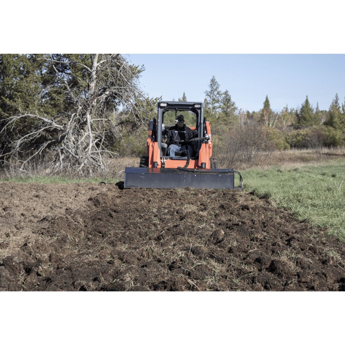 Prime Attachments skid steer tiller attachment leveling ground